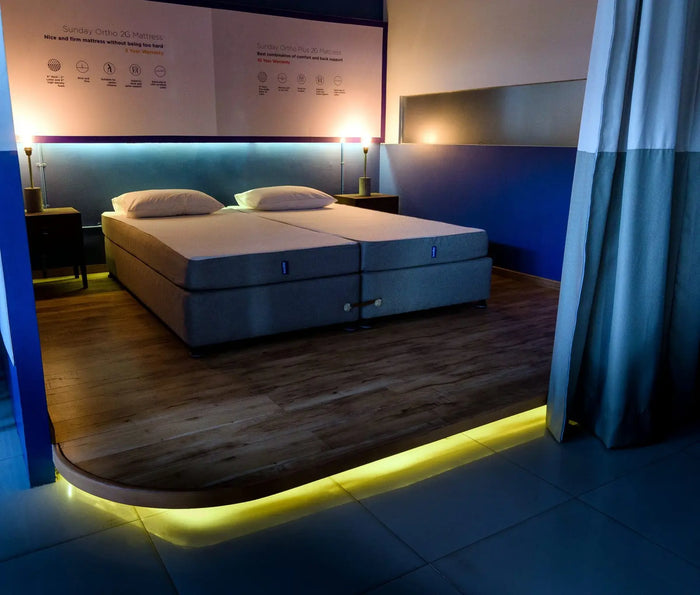 The night platform in the Bengaluru Sleep Lounge, lit from below